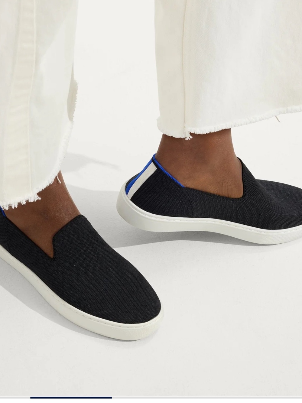 Rothy's Womena Slip-On Sneaker in Navy and White